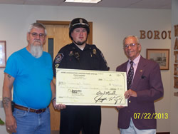 Veterans help provide Harleys for police