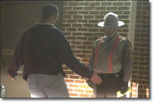 State Trooper Ed Thomas administers field-sobriety tests